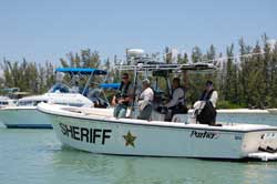 sherrif boat stopping a boat