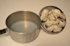 Pan with clam juice after boiling clams