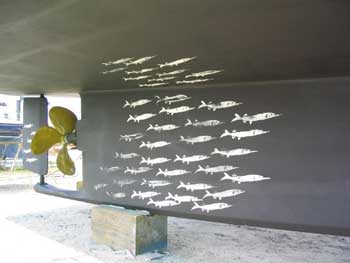 bait fish painted on the bottom of a boat